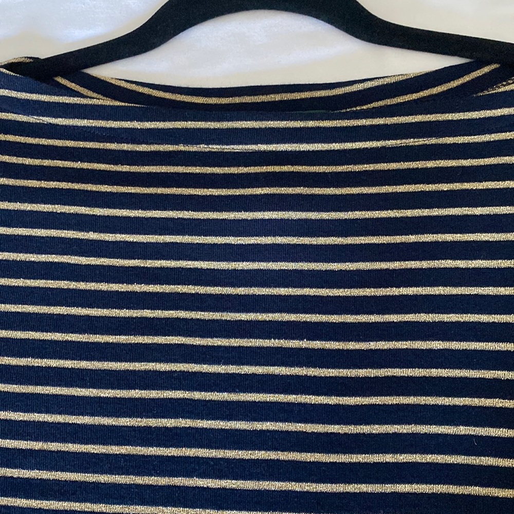Gold and navy blue top.